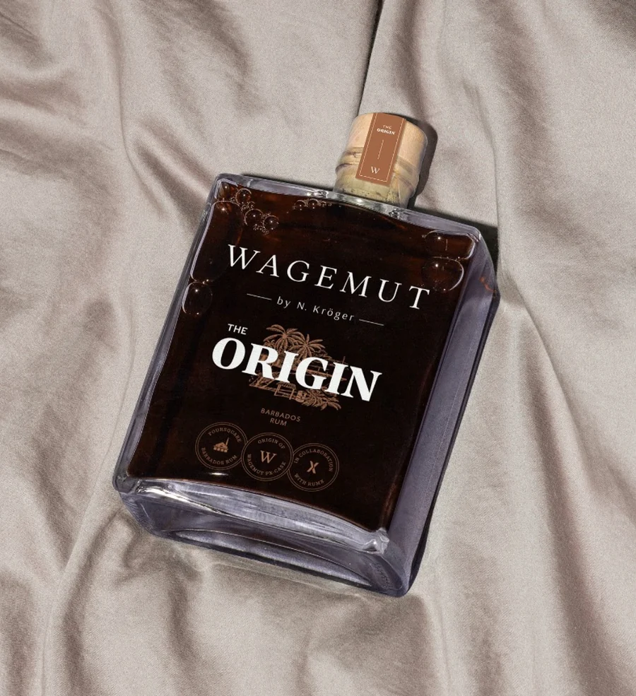 The Wagemut The Origin bottle with its dark label and three seals